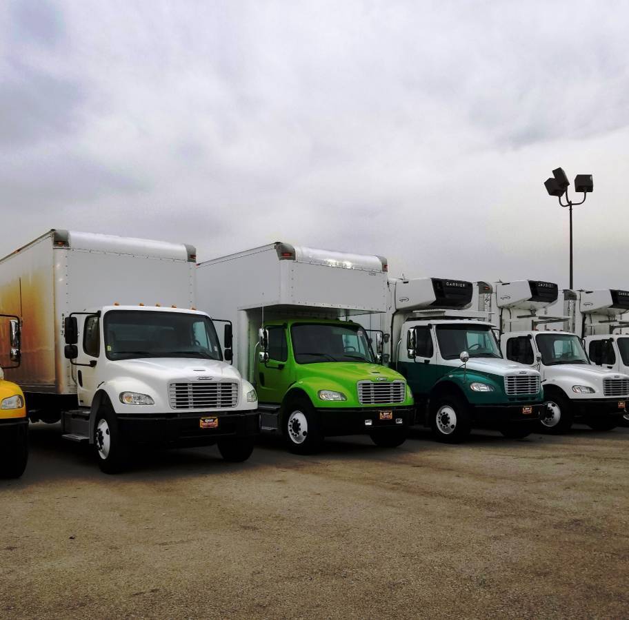 Fleet of Han's Moving box trucks lined up