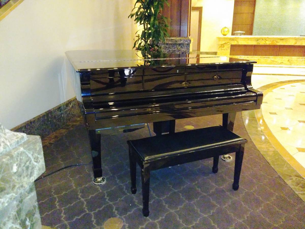 Grand piano staged and ready to be moved
